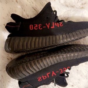 i’m selling these yeezys colored black and red very comfortable shoe